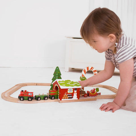 Girl playing with Christmas Candy Crane Tunnel