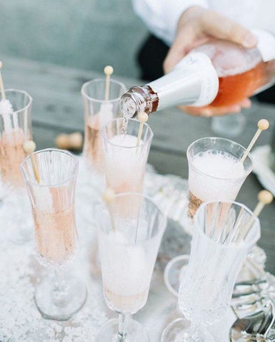 champagne flutes, cheers with bridesmaids, drinking the morning of your wedding