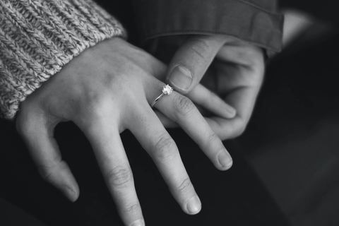 A classic engagement ring, captured just after a proposal