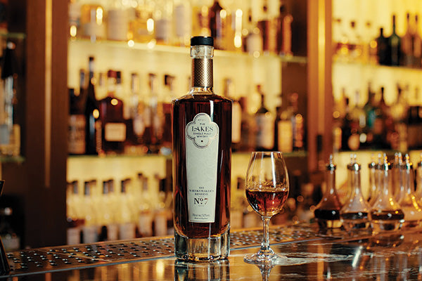 The Whiskymaker's Reserve No.7 on a bar with copita glass