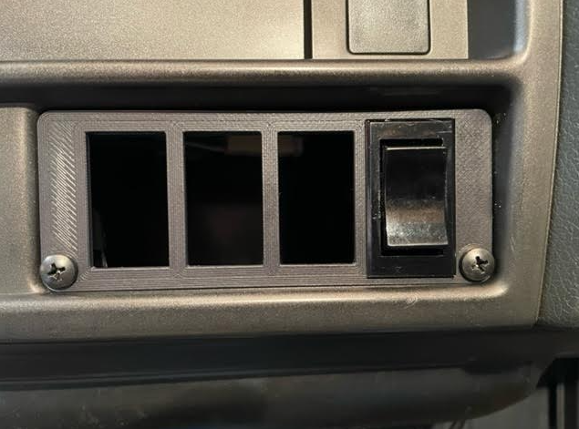 Switch panel installed into FJ62 toyota landcruiser with a switch installed flush mount