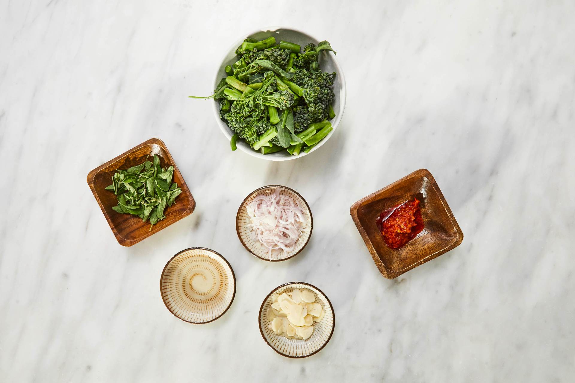 Pizza Crostini with Ricotta and Marinated Broccolini