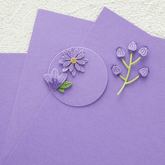 Artist “Grows” Tiny Paper Flowers That Will Stay in Bloom Forever