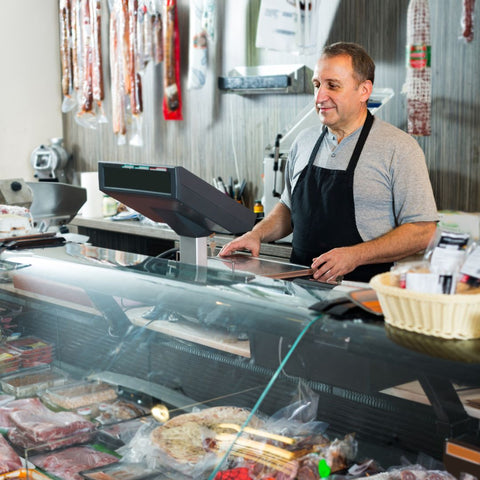 butcher with meats