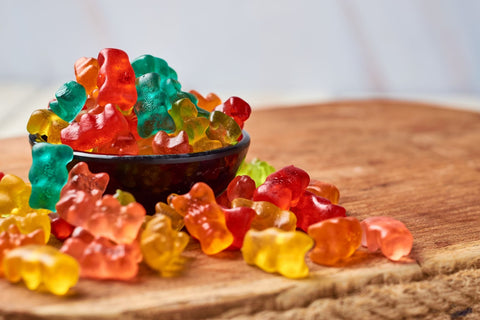 Bowl of multi-colored gummy bears.