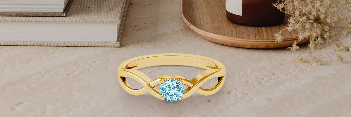 Round Aquamarine Crossover Ring