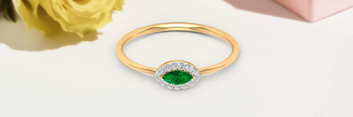 Marquise Shape Emerald Ring With Diamond