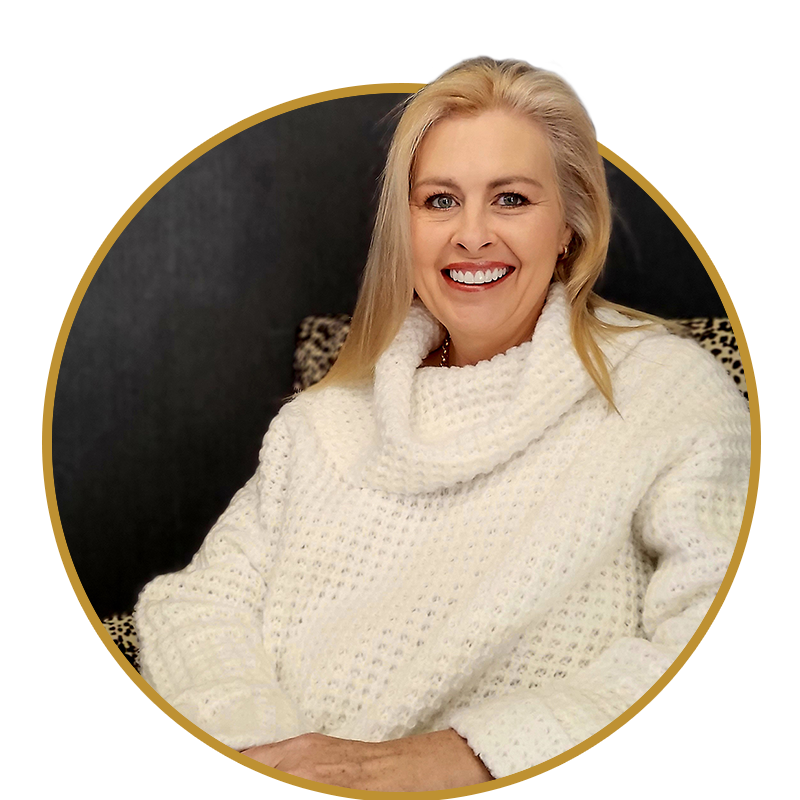 Katie Clack, owner of Jolie Clinic. Caucasian woman with blonde hair wearing white woollen jumper
