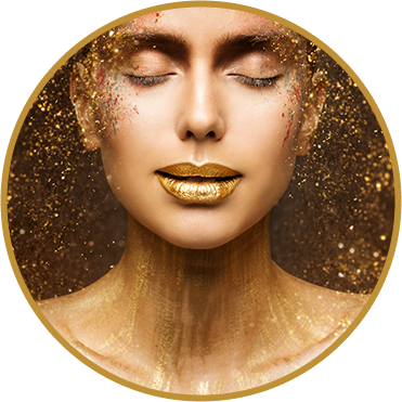Lady with gold lipstick, gold eyeshadow and gold painted neck with gold glitter falling over her