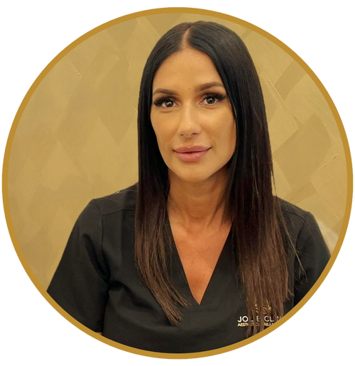 Vanessa Xenos, Beauty Therapist wearing Jolie Clinic uniform