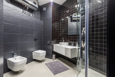 a modern bathroom shower and bidet