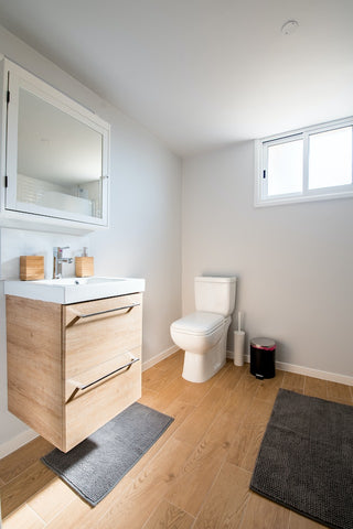 a bathroom interior with non-slip mats