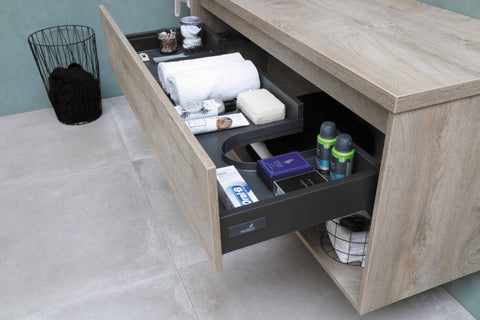a drawer with bathroom essentials inside a brown wooden table