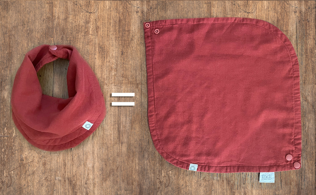 pic shows rust Infinity bib unfolding into a perfect square for additional use as a wipe cloth or burp cloth