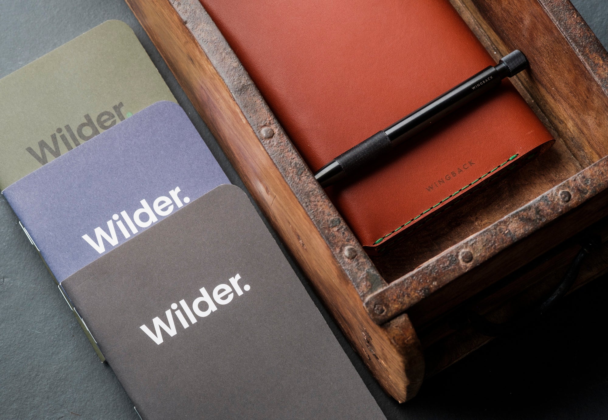 Shop Wilder notebooks and Wingback Winston Travel Wallet