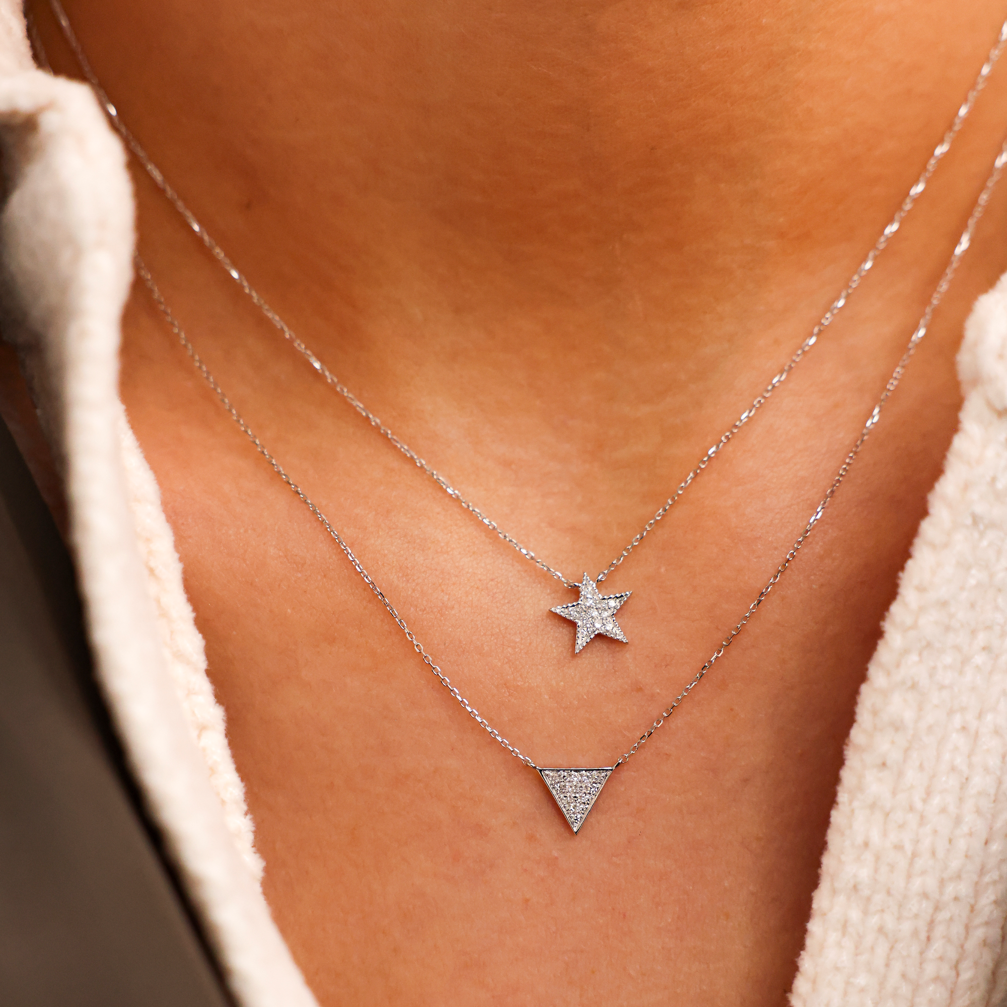 Star necklace by SoCharm adorned with a real white diamond