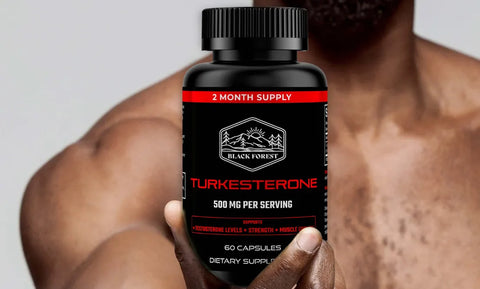 Hand holding Turkesterone 500 mg - Black Forest Supplements