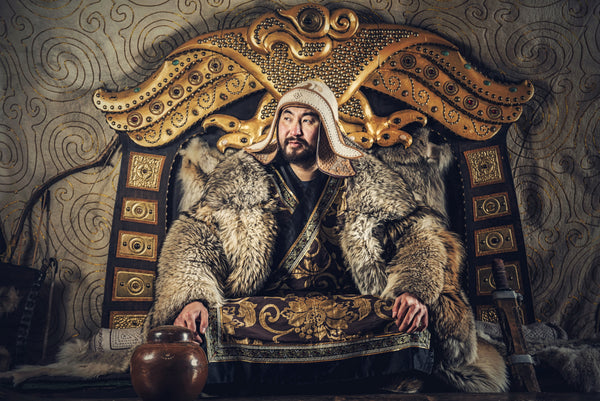 Emperor Genghis Khan thinking at his throne