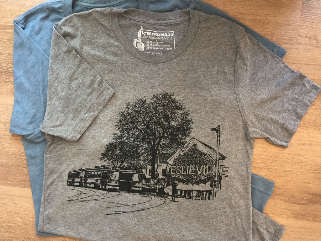 Grey and blue t-shirts with screenprinted street scene of Leslieville, Toronto by tresnormale