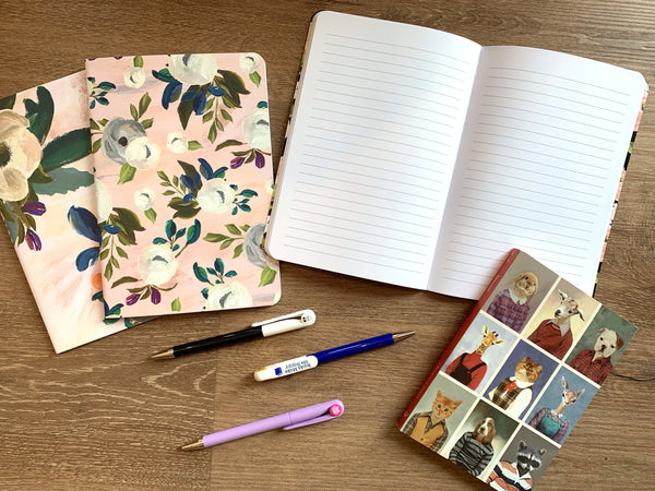 Pretty notebooks and pens for students of all ages!