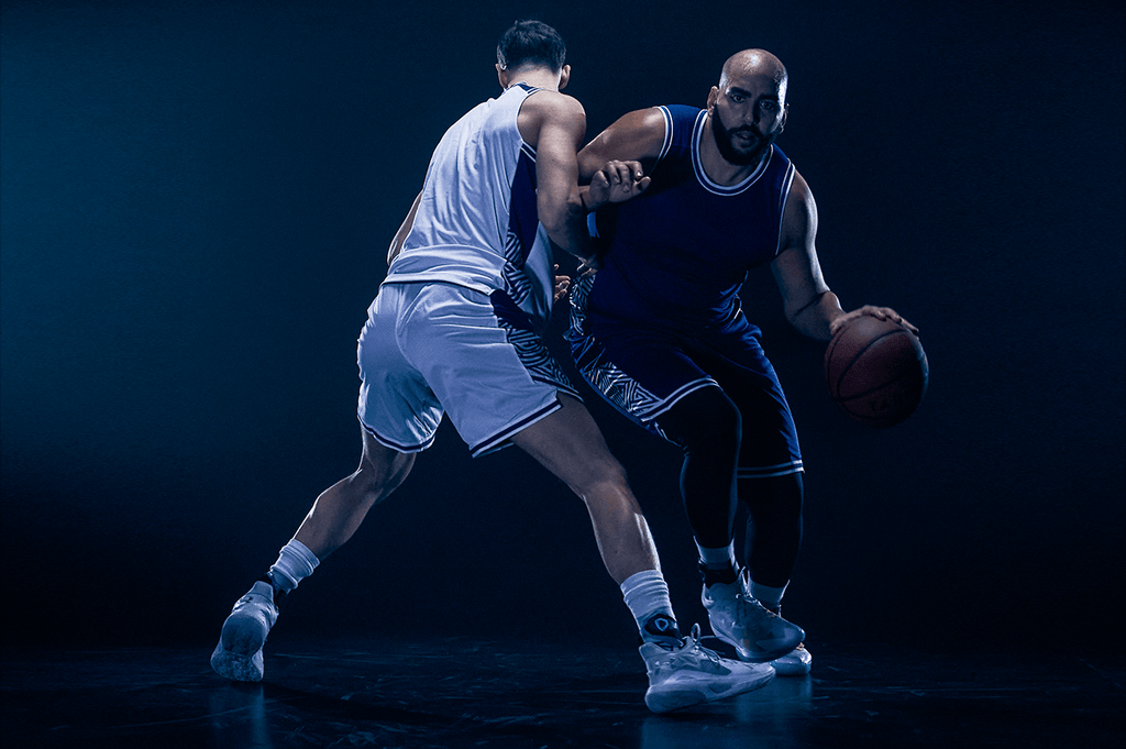 Two basketball players with ankle braces from BetterGuards