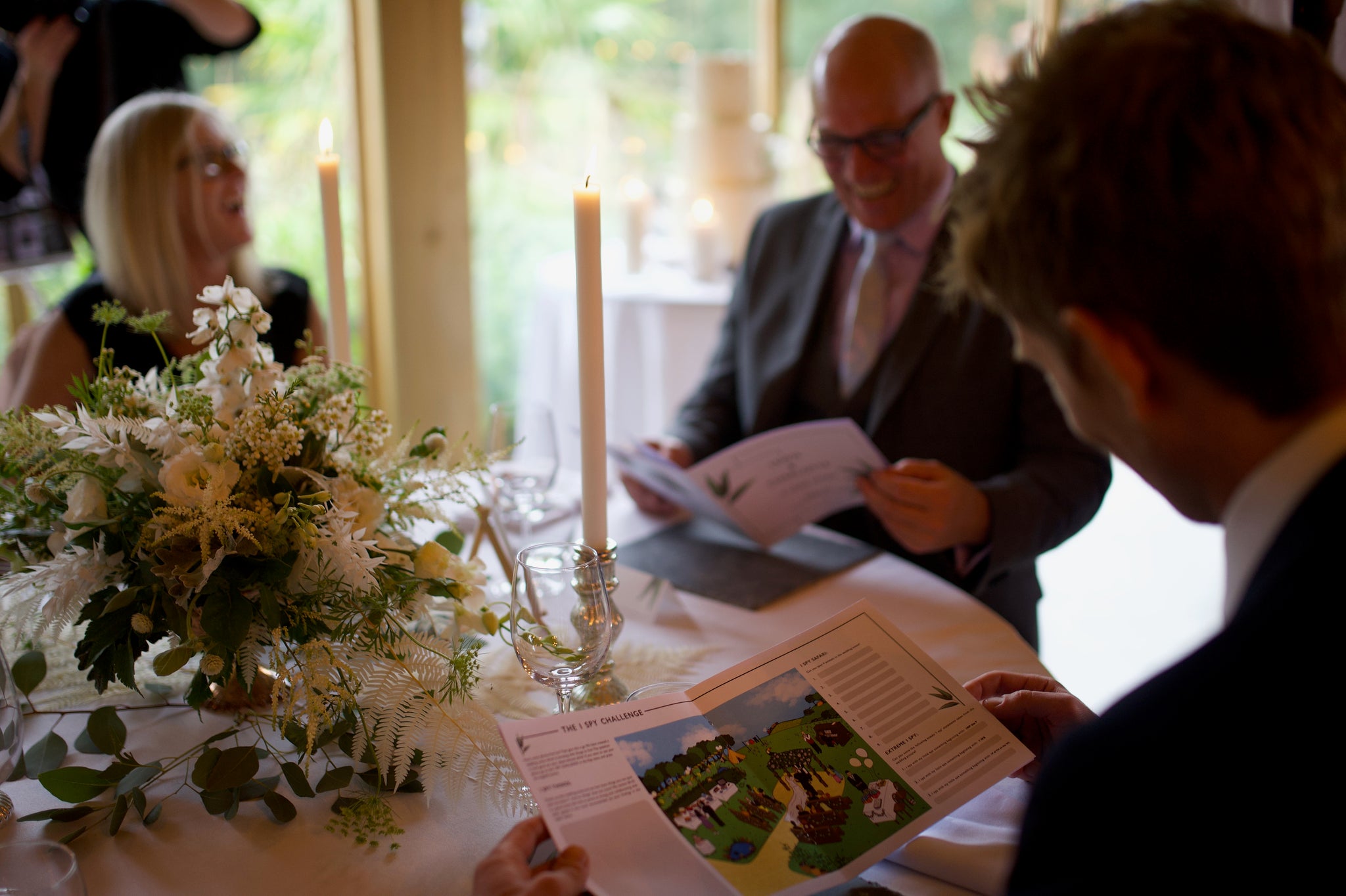 CherryTop Weddings Activity Booklets at a wedding reception