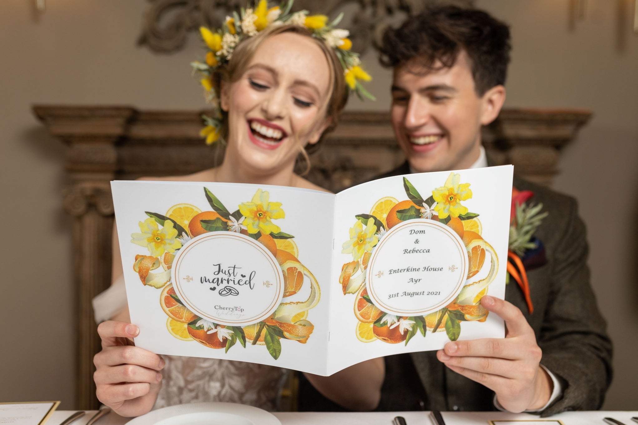 Wedding couple laughing at CherryTop Weddings booklet