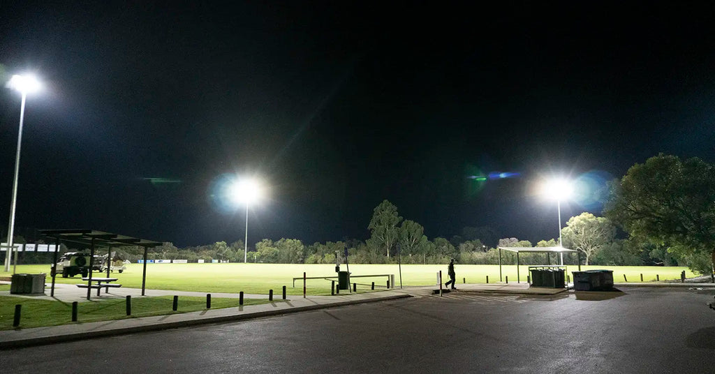 Community sports oval with new LED lighting viewed from car park