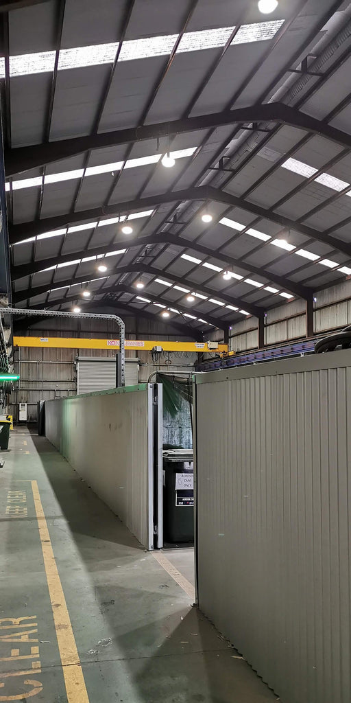 LED high bay light fittings installed inside industrial workshop