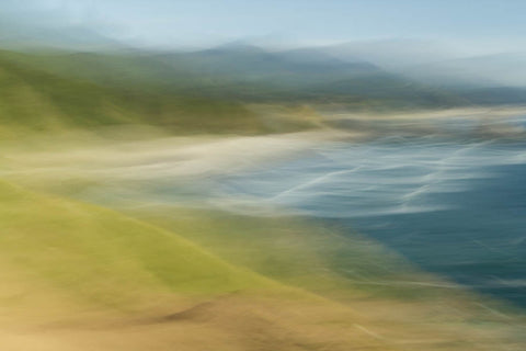 Abstract photo of a coastal bay with spring green forming a u-shape on the left side and a blue bay with waves on the left 