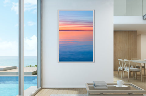 spacious room with soothing blue and orange sunset abstract created through icm