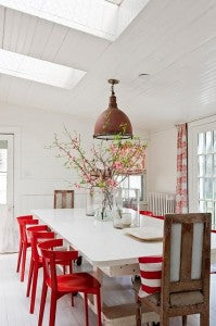 White Dining Room with Red Accents #white #red #dining #room #table #chairs #vaulted #ceiling #skylight