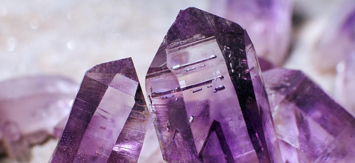 large amethyst points close up zodiac birthstone of Aquarius star sign