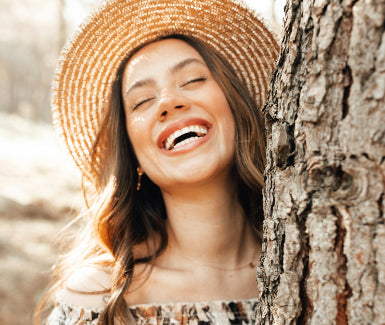 Woman happy and empowered by Inspiring Australian mindfulness brand sticks and stones image pexel