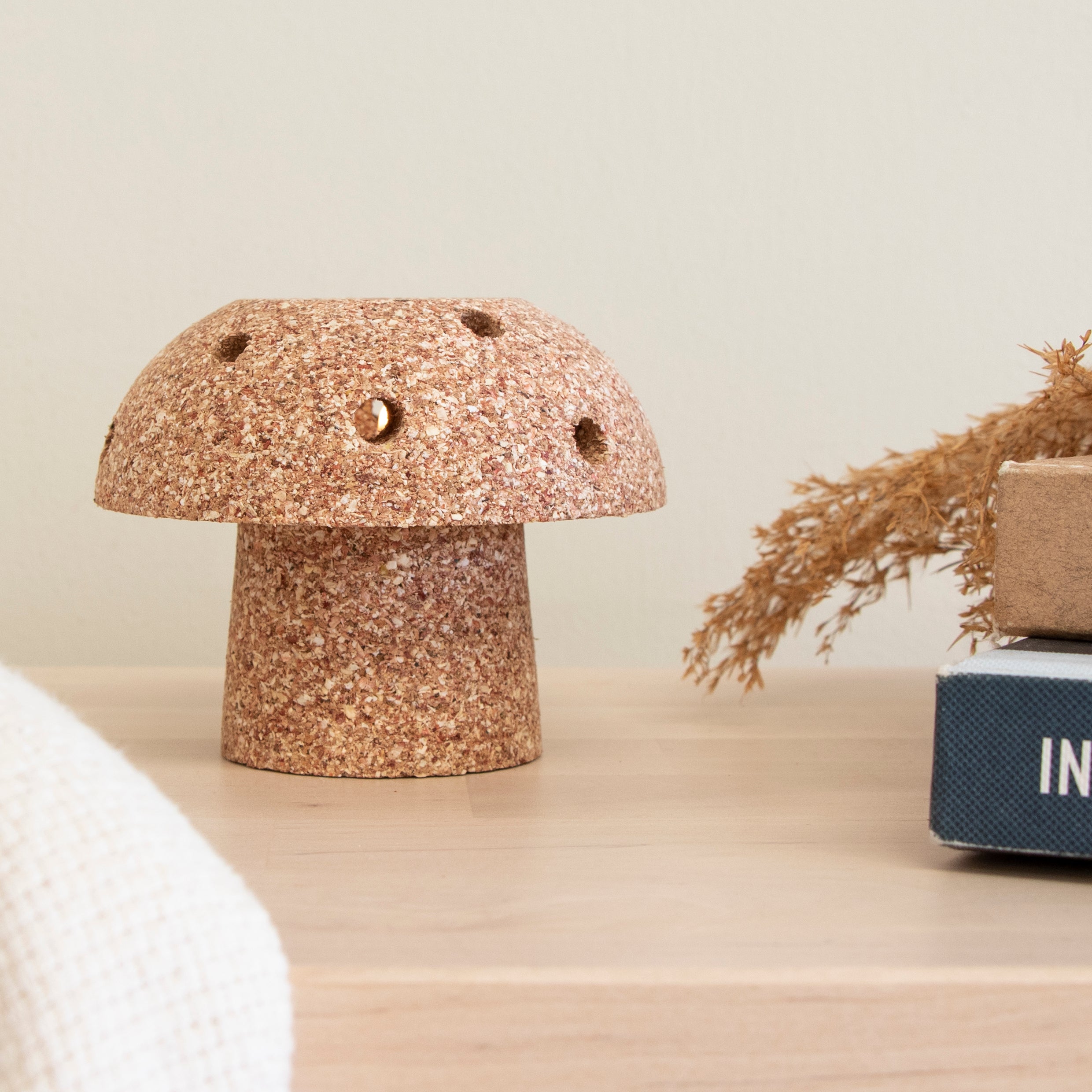 mushroom shaped tea light holder made from sweetcorn husks