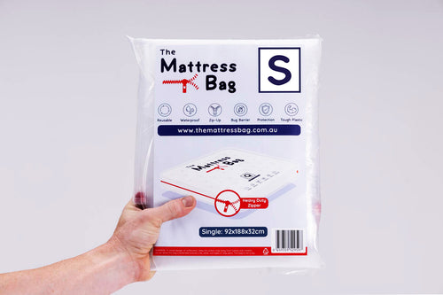 man holding the queen mattress bag packaging up with white background