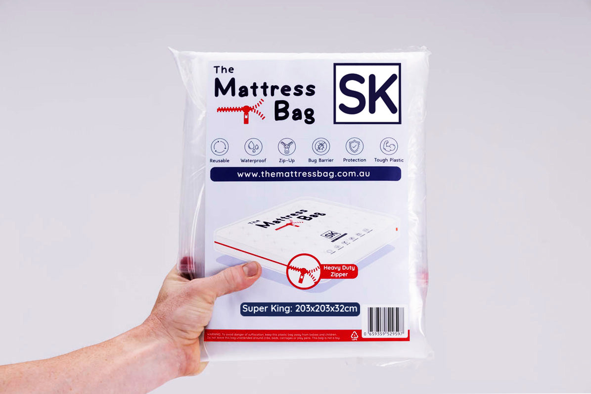 man holding the queen mattress bag packaging up with white background