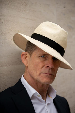 A man wearing a Christys' Panama hat