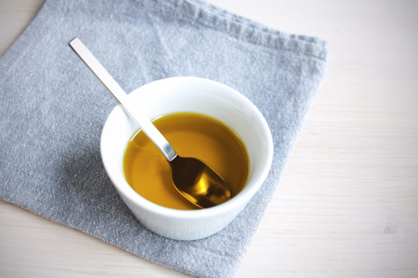 a cup of extra virgin olive oil