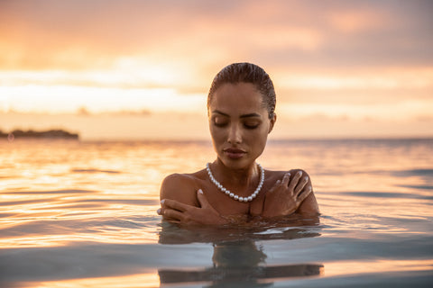 Woman in the sea with a pearl necklace | Angelina Jolie lookalike
