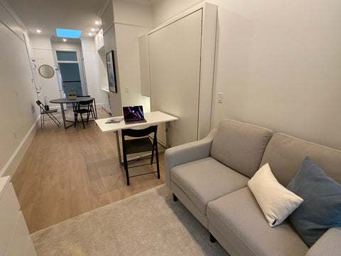 Penelope Dining Murphy bed being used as a home office