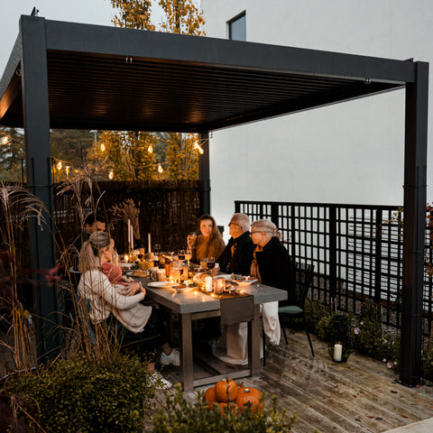 anthracite pergola with adjustable roof louvres and company