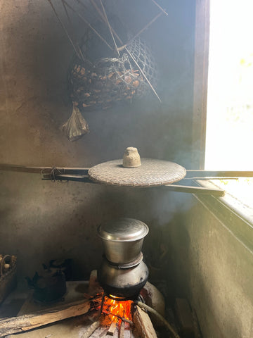 Singpho Fireplace with swing on top for aging phalap