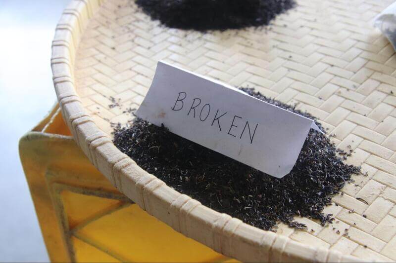 broken leaf tea displayed on a tray