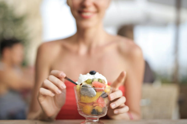 female model eating health food