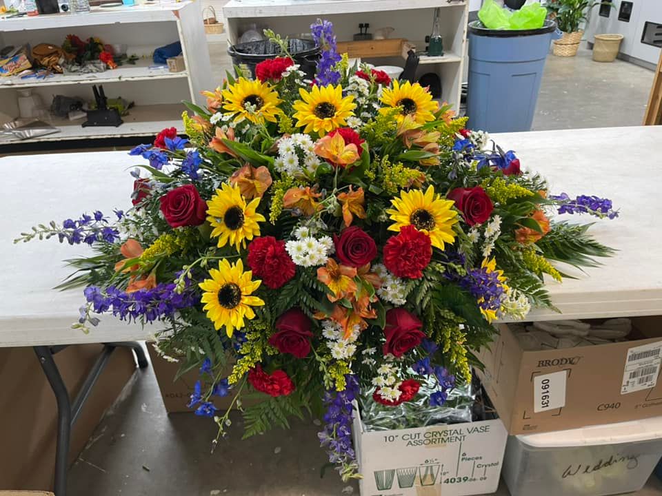 Sunflower Mix Casket Spray - Walkers Flower Basket product image