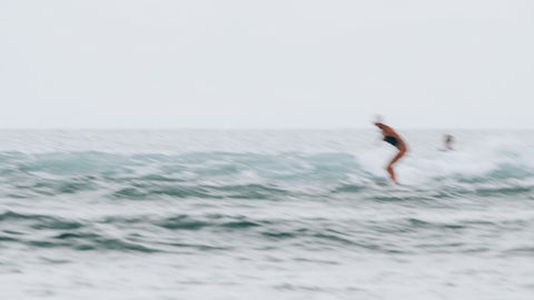 surfing at old man's beach in bali