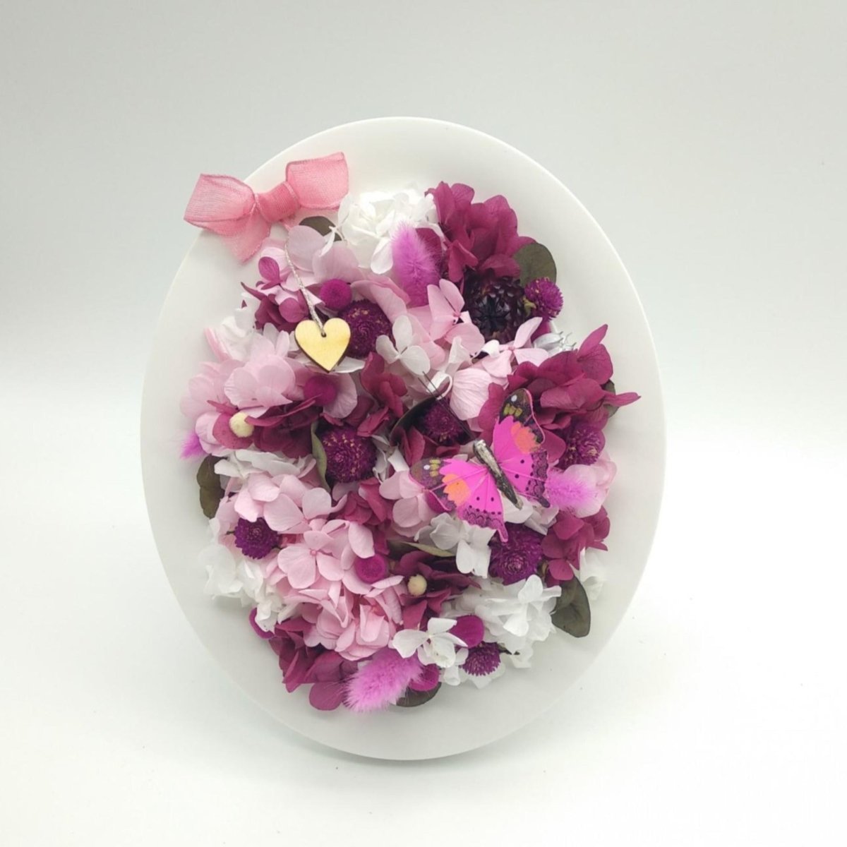 Cuadro ovalado con flores eternas – Floreate