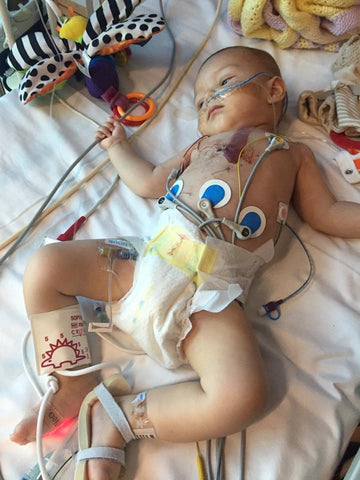 baby with hospital wires