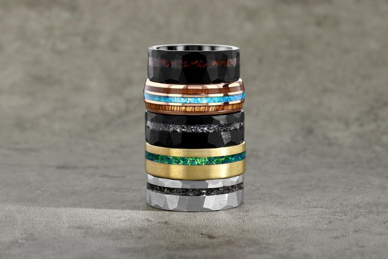 Stack of unique men's wedding bands